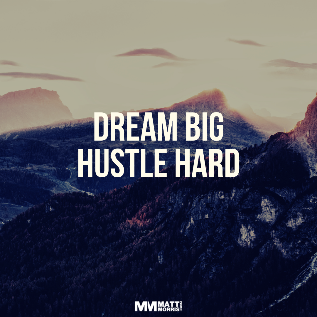 A mountain scene with bold text : DREAM BIG OR HUSTLE HARD.